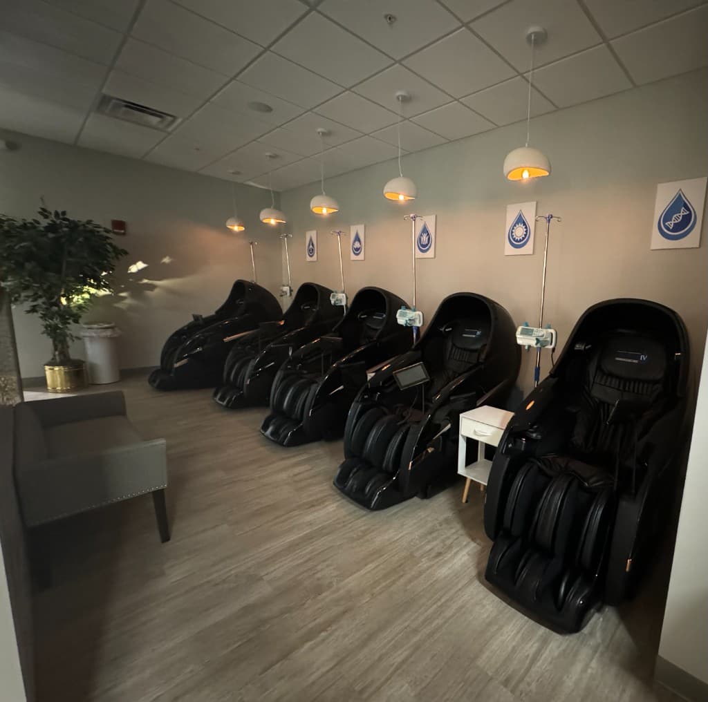 Premium zero-gravity massage chairs with IV stations in the Prime IV Hydration & Wellness VIP lounge in Huntsville, AL